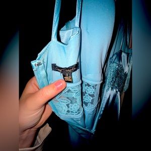 I bought for my junior prom, it’s never been worn.